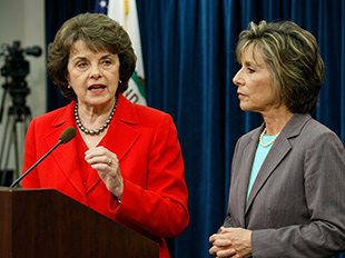 Sen. Barbara Boxer speaks, with Sen. Diane Feinstein by her side